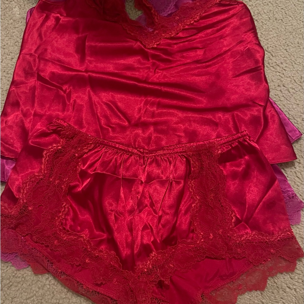 Satin pajama set size small 2 colors. Fuscia and red $20 each lace backing